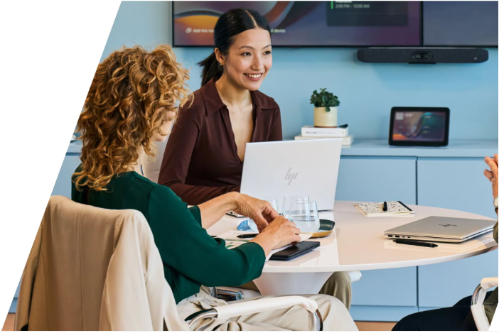 Professionals collaborating with HP workplace technology